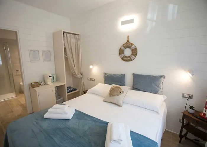 Laura E Christian - Penzion Grado